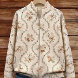 Ingrid - Knitted vest with delicate floral vines